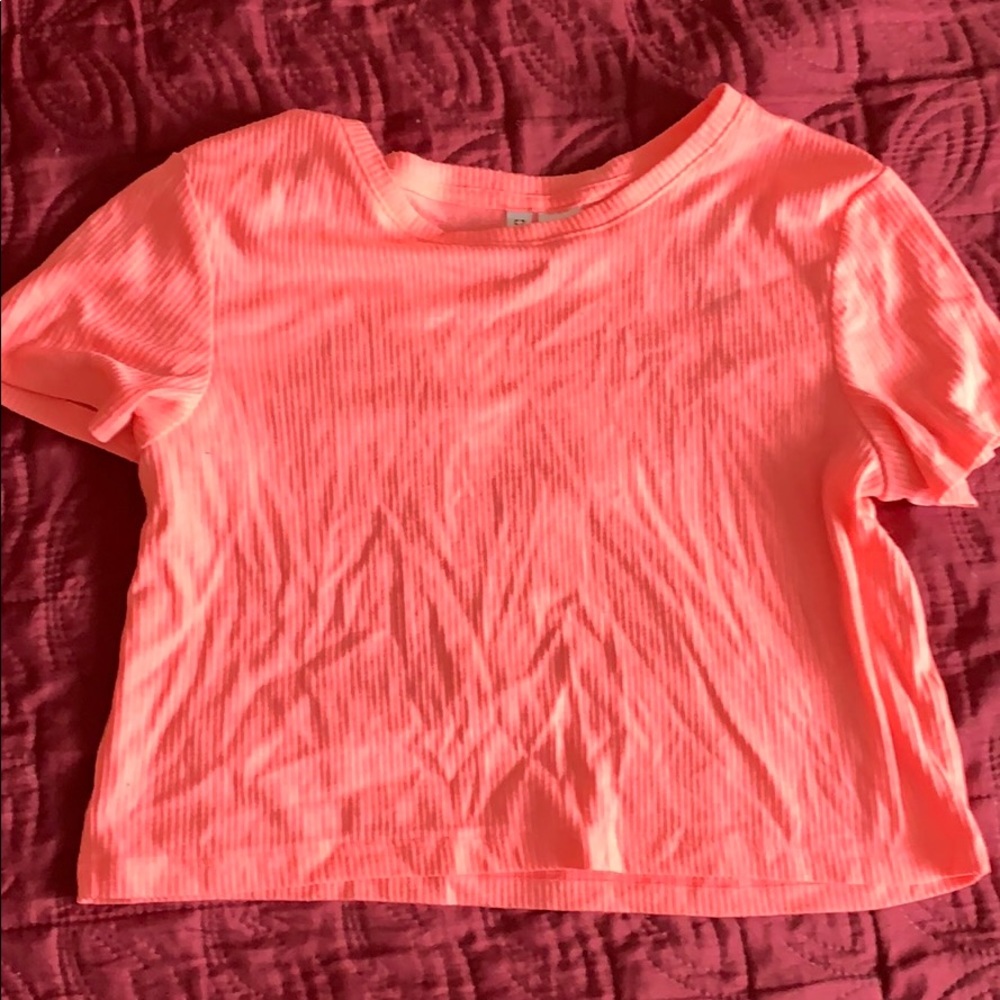 Pink crop top.